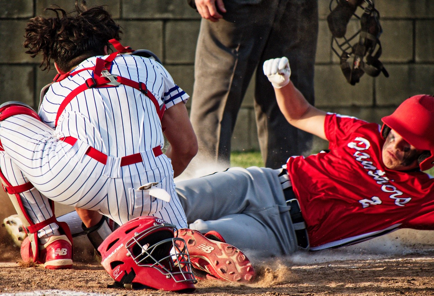Panther catcher Tyler Perez tags a North Hopkins runner out at home. [see more hits]